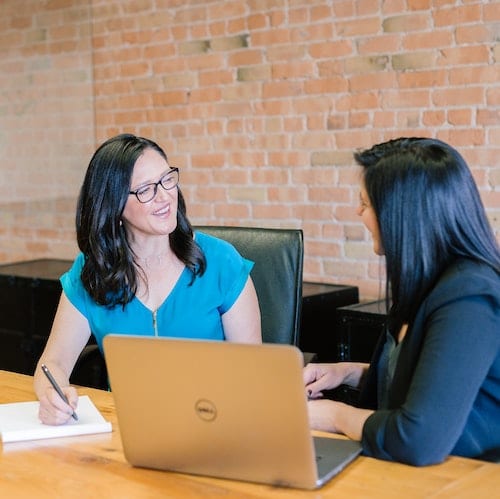 Women discussing opening a foundation