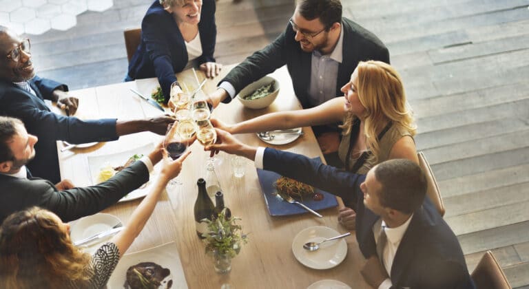 People eating and drinking at a donor appreciation event